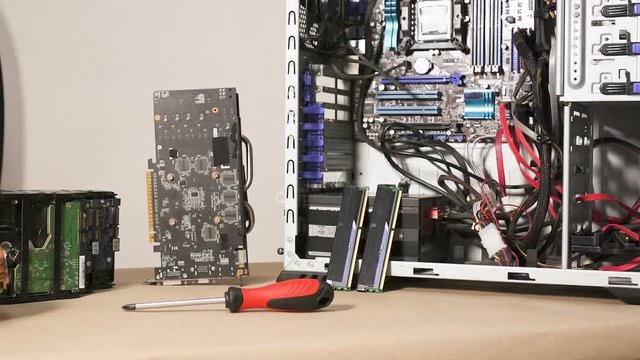 Disassembled Hardware. Fixing Computer in  Service Center