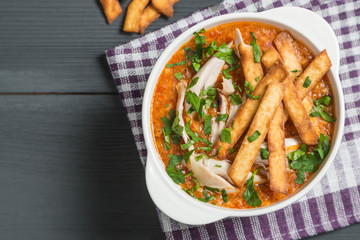 Tortilla soup with chicken. The national dish of Mexican cuisine. The view from the top. Copy-space.