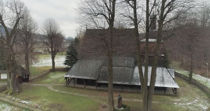 Aerial shot of the old church in Europe, winter 4k