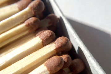 Matches in a box in the sun close-up blurred background