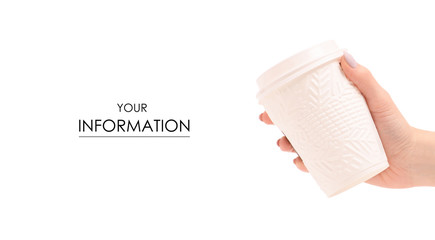 A cardboard cups of coffee snowing winter Christmas with snowflakes in hand pattern