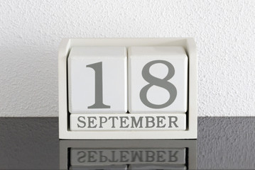 White block calendar present date 18 and month September