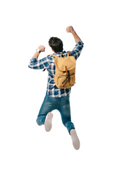 back view of student jumping with backpack isolated on white