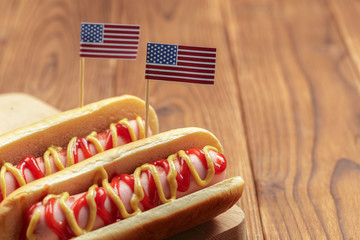 Hot dogs on wooden background