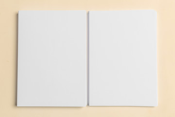 White business card on wooden table. Blank portrait A4.