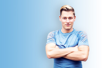 portrait of blond handsome young sportsman
