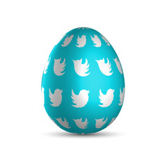 Blue Easter egg with white birds and light shadow