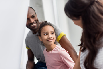Obraz premium happy african american family spending time together