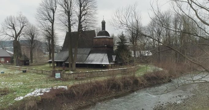 Aerial shot of the old church in Europe, winter 4k