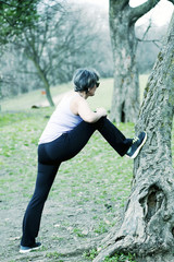 Middle age woman practice outdoor fitness