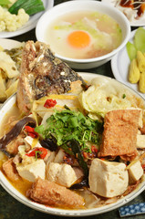 Fish head casserole on the table      