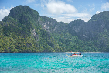 Fototapeta na wymiar El Nido bay scenic islands view with bangka boat, Palawan, Philippines