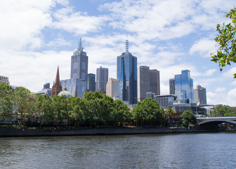 Fototapeta na wymiar City skyscrapers across the Yarra River in Melbourne, Australia