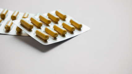 Medication pills on white background