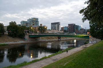 Fototapeta na wymiar Bridge over the Neris River in the capital city of Vilnius in Lithuania