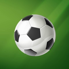 Ball for soccer on green background