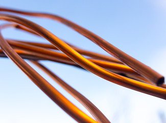 Copper wire against the blue sky