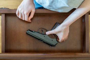 Child found pistol in drawer at home.