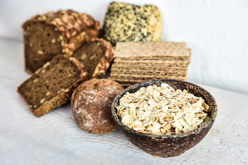 Various types of wholemeal bread and rolls - obrazy, fototapety, plakaty