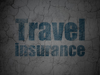 Insurance concept: Blue Travel Insurance on grunge textured concrete wall background