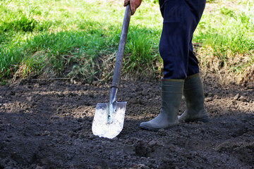 A man with a shovel.