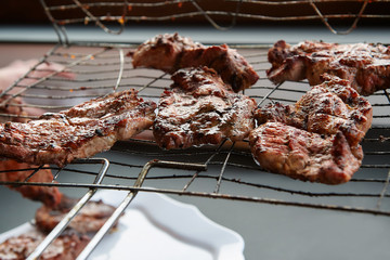 Fried steak grilled in a grill