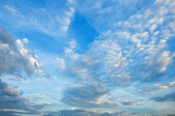 blue sky background with white clouds.
