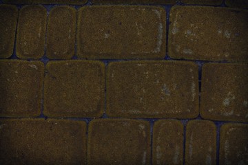 Autumn maple Abstract background of orange tile brick wall. Texture surface of stone wall