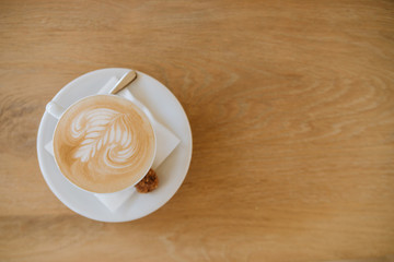 Coffee On A Wooden Background