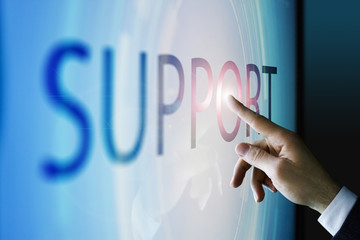 Businessman touching the screen about support