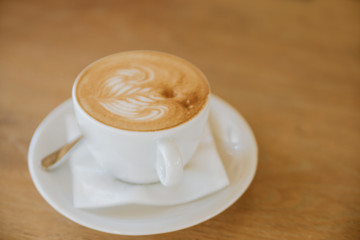 Coffee On A Wooden Background