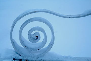 Street decoration of the bench. Metal snail.