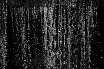  Floating water and flying drops. blue. Gray. black and white background.