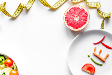 concept slimming diet fresh vegetables on white background top v