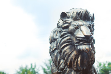 Naklejka premium Lion statue in city Park