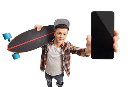 Teenager With A Longboard Showing A Phone