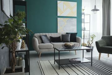 Spacious green living room interior