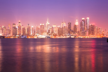 Fototapeta na wymiar Reflection over the Hudson River and Skyline of midtown Manhattan, New York City, NY, USA