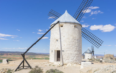 Travel, Beautiful summer above the windmills on the field in Spain