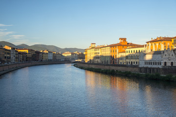 Obraz premium Pisa, historic buildings along the Arno river