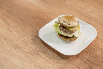 Champignon burger on plate. - 198473813