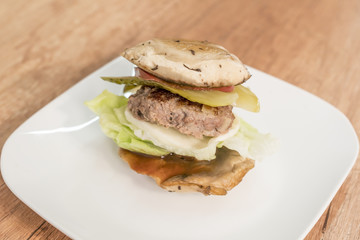 Champignon burger on plate. - 198473862