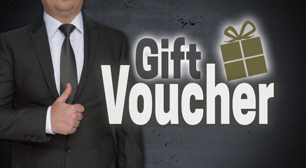 Gift Voucher concept and businessman with thumbs up