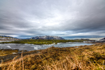 Fototapeta premium A beautiful Icelandic landscape with multiple splash of colors