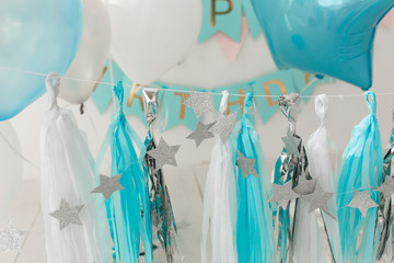 Blue and white foil garland decor for birthday party