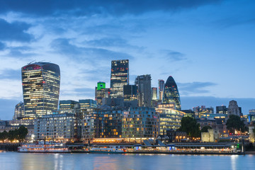 Fototapeta premium Thames embankment and london skyscrapers in City of London after sunset