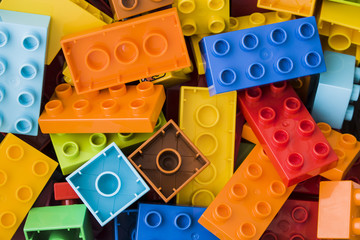 colorful toy bricks on white background