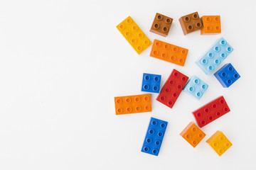 colorful toy bricks on white background