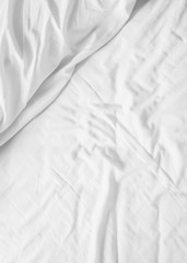 messy white bed sheets