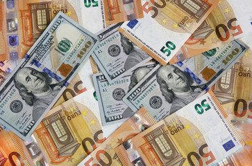 US dollars and euros background